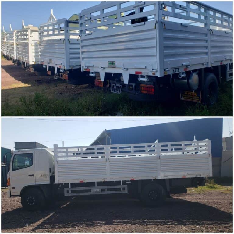 Almond trucks with white metal cargo beds designed for freight transport and manufacturing needs.